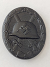 Black Wound badge marked 65 ( Klein & Quenzer). 